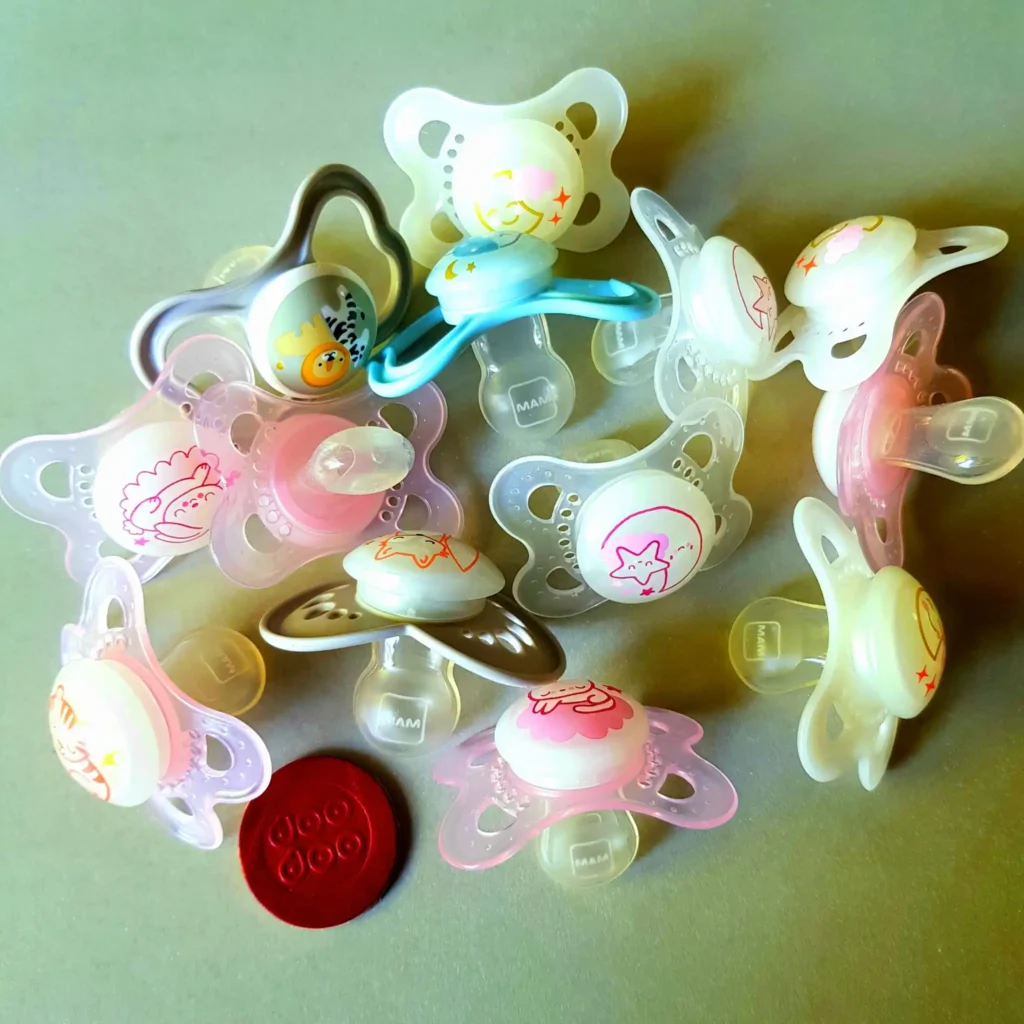 Selection of Doodoo adult pacifiers